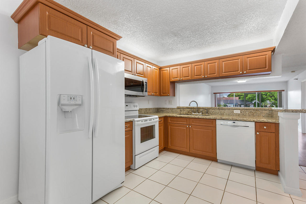 420 Northwest 67th Street, Unit K104 Boca Raton, FL 33487 - Photo 3 of 25 Kitchen