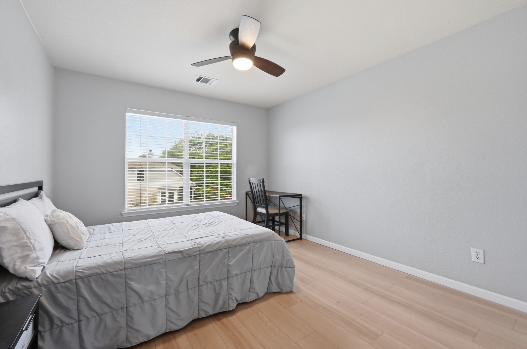 2700 Cradlerock Terrace Austin, TX 78748 - Photo 23 of 29 a bedroom with a bed and a window