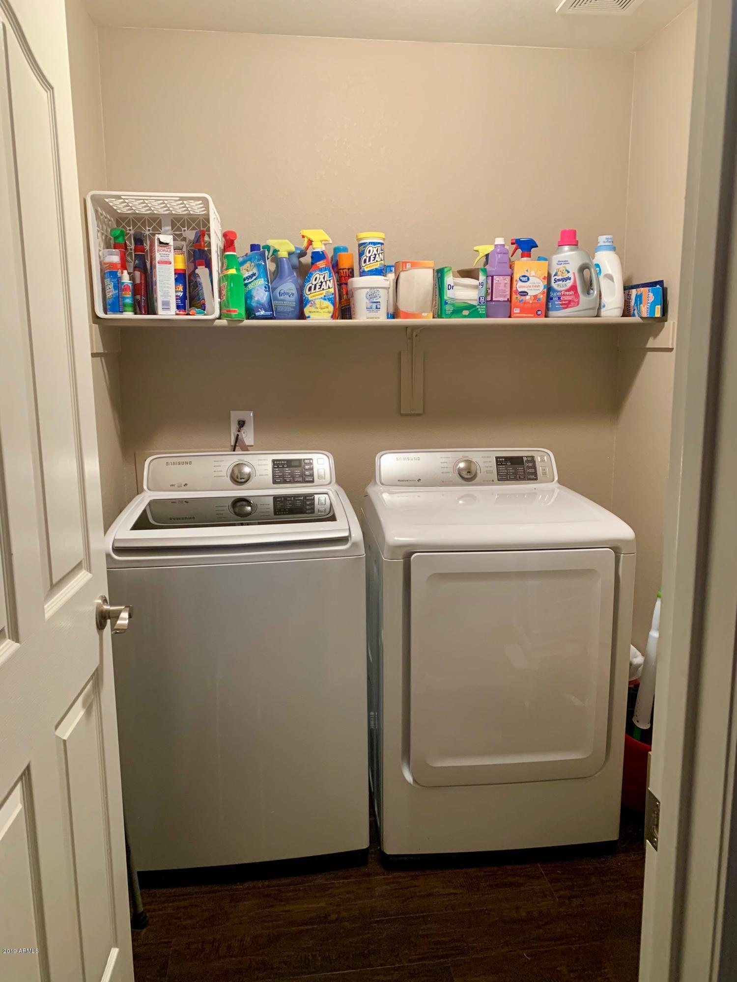 2515 West Romley Road Phoenix, AZ 85041 - Photo 12 of 20 a utility room with dryer and washer