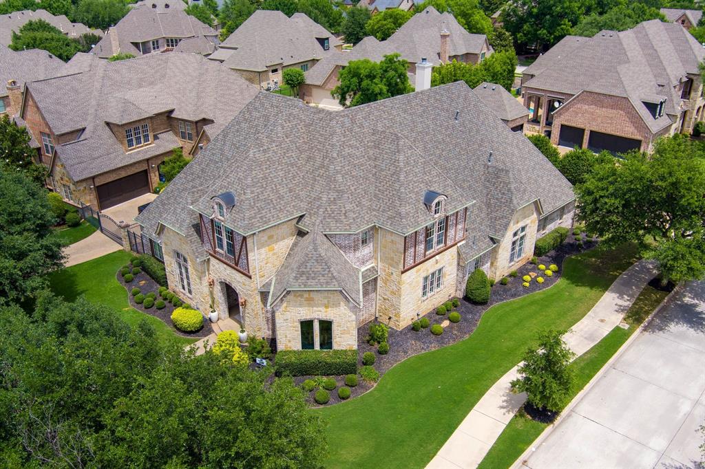 2101 Vail Road Southlake, TX 76092 - Photo 1 of 40 an aerial view of multiple houses with a yard
