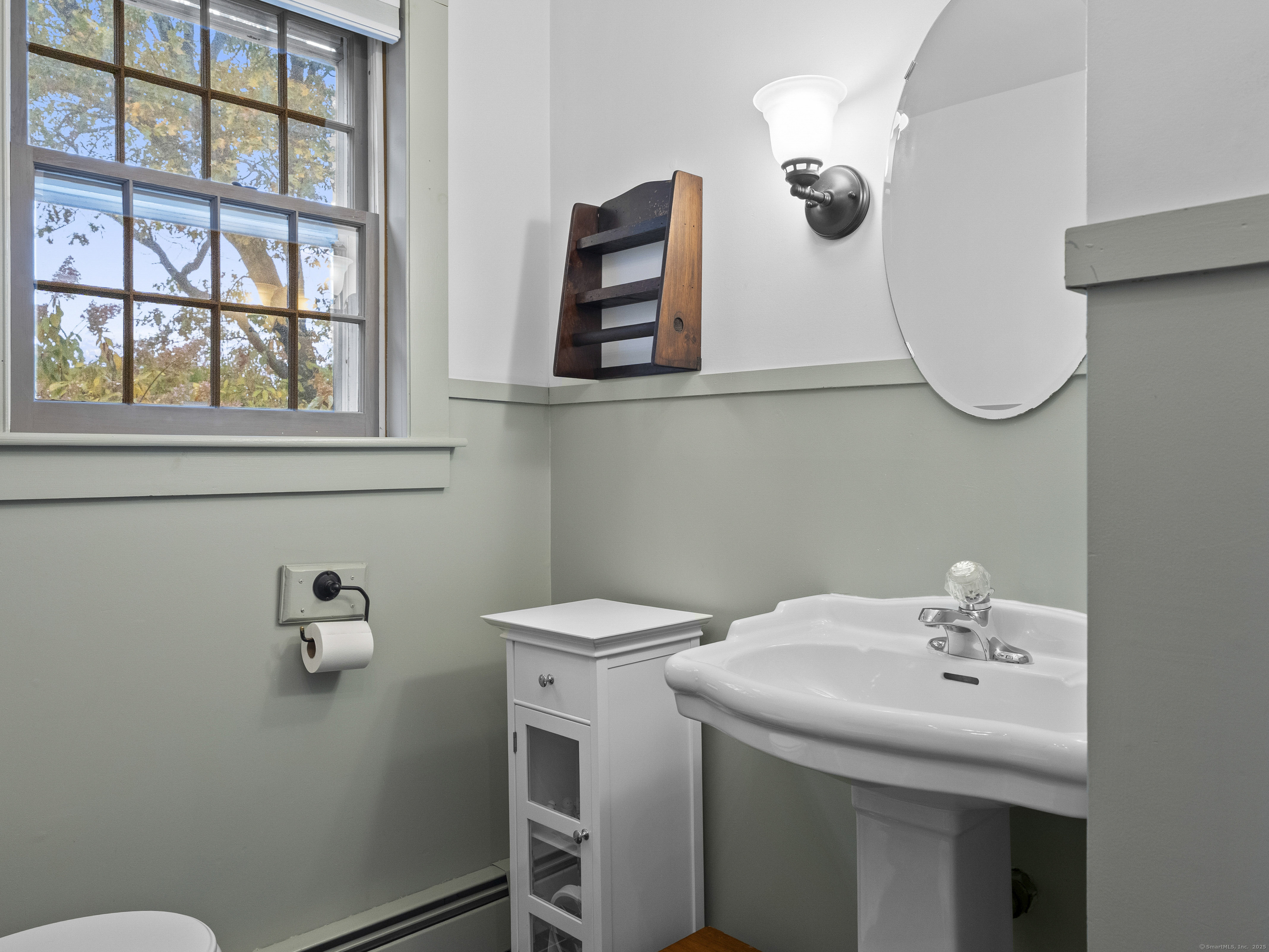 209 Main Street Deep River, CT 06417 - Photo 12 of 40 a bathroom with a sink and a mirror