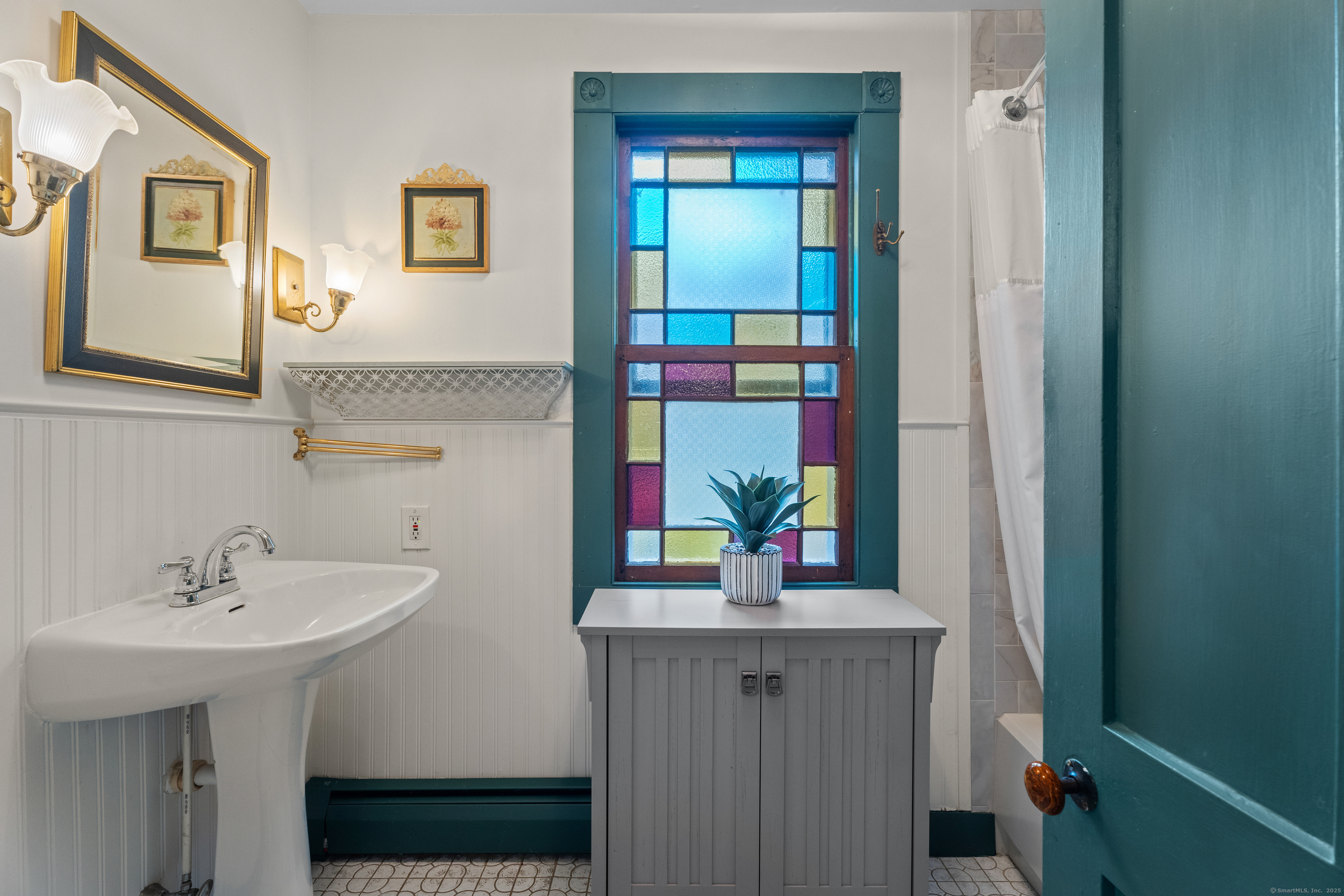 209 Main Street Deep River, CT 06417 - Photo 22 of 40 a bathroom with a sink and a mirror