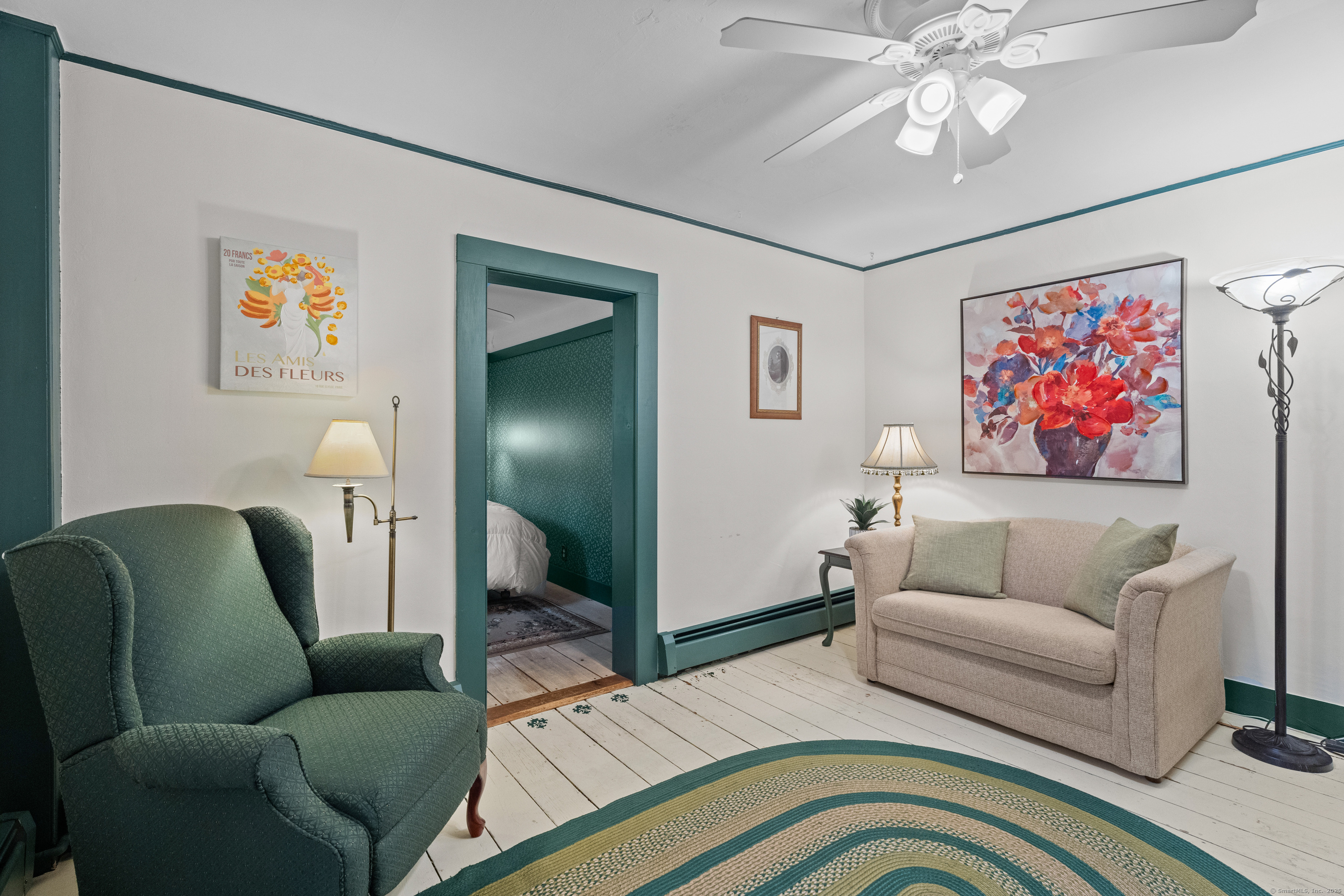 209 Main Street Deep River, CT 06417 - Photo 24 of 40 a living room with furniture and a chandelier