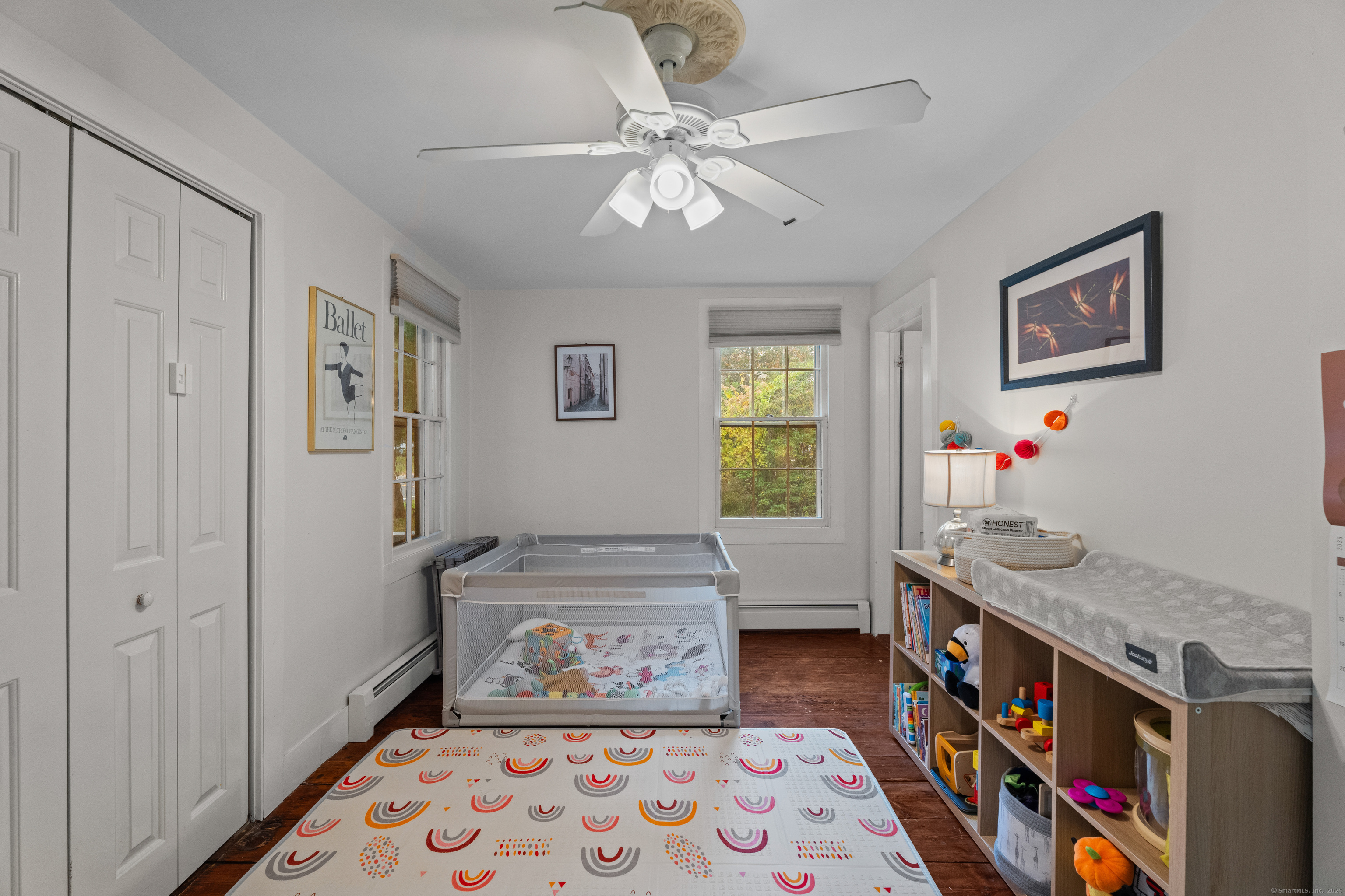 209 Main Street Deep River, CT 06417 - Photo 38 of 40 a very nice looking bedroom with a bed and a chandelier