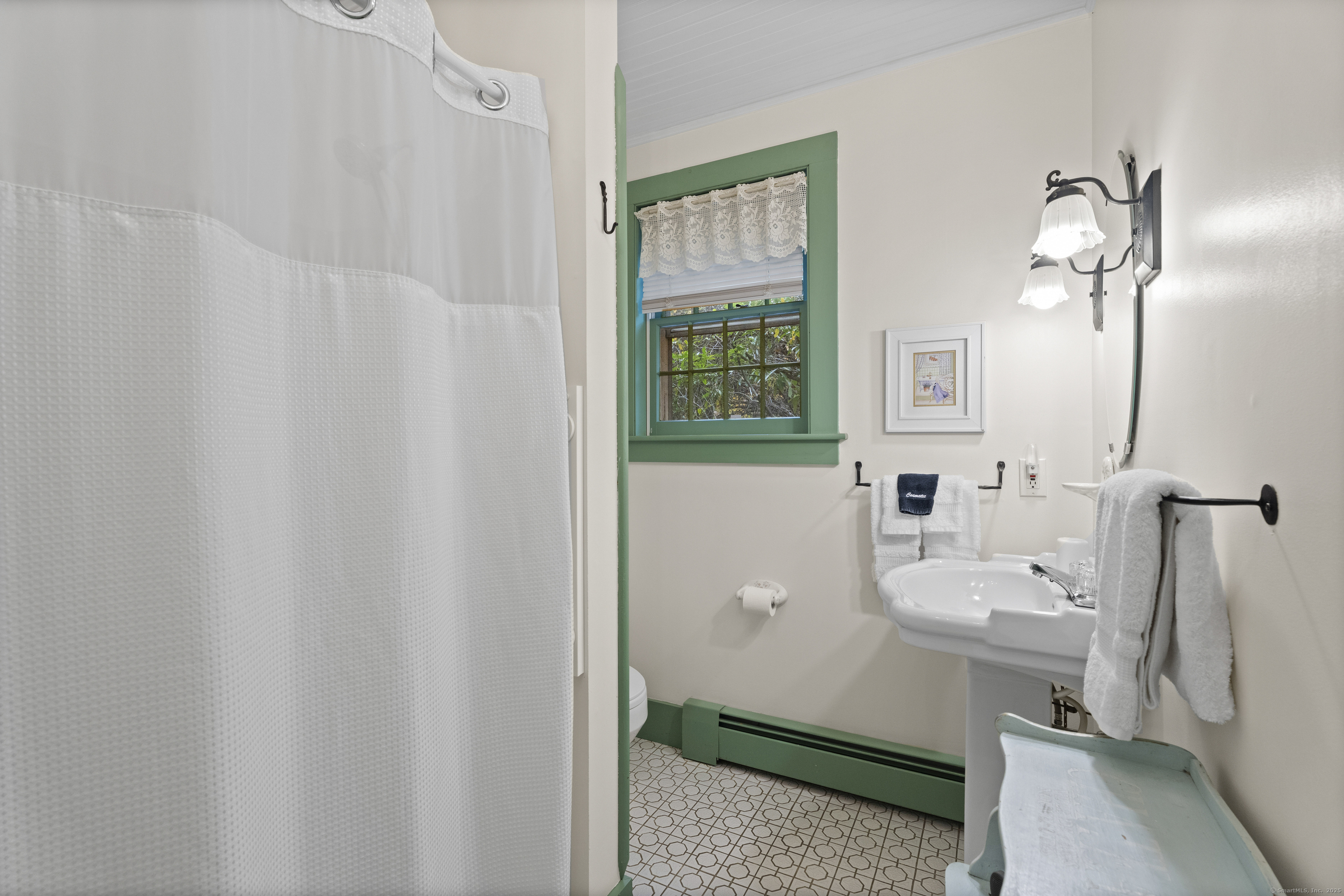 209 Main Street Deep River, CT 06417 - Photo 40 of 40 a bathroom with a sink a toilet and shower