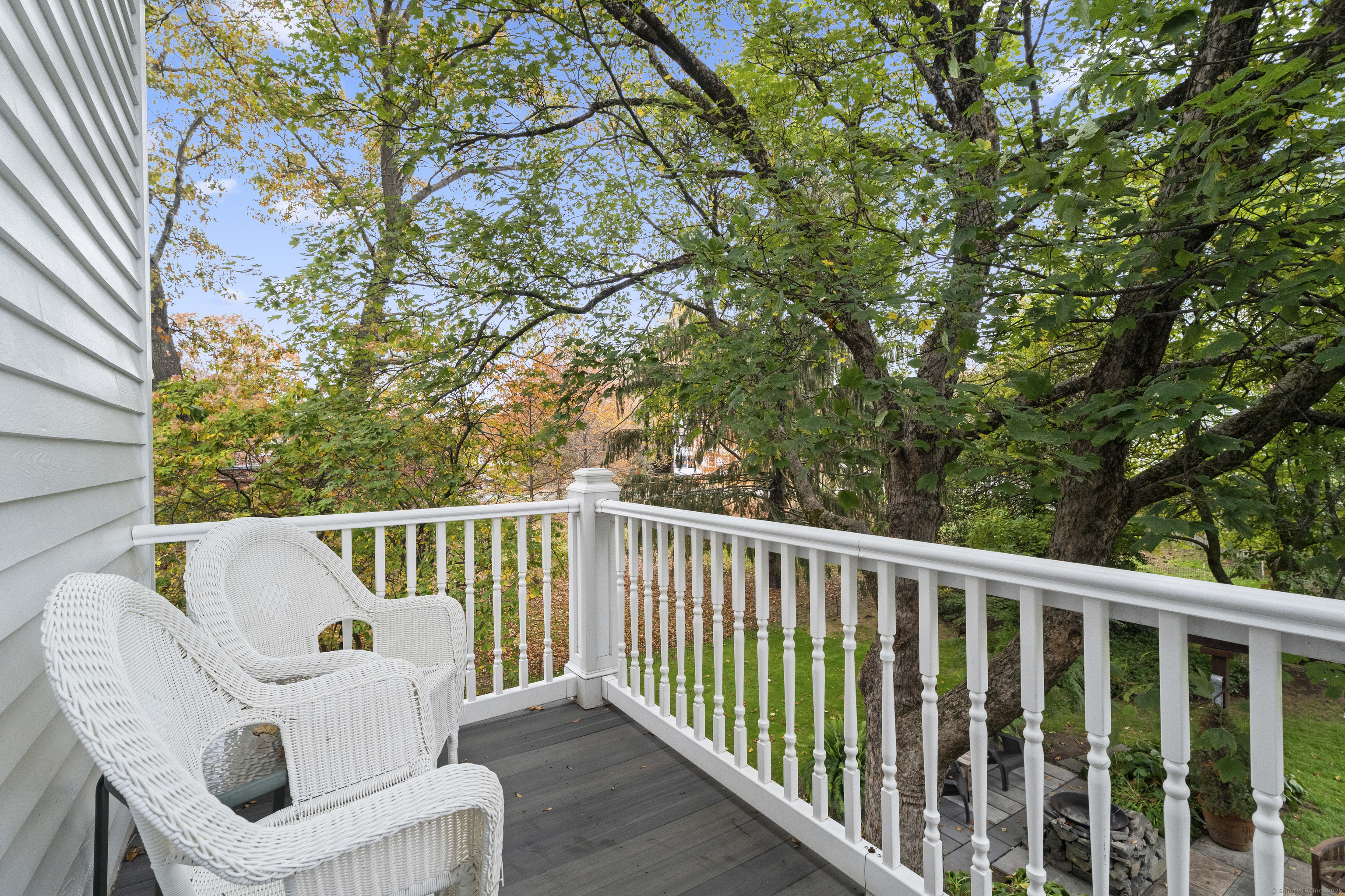 209 Main Street Deep River, CT 06417 - Photo 10 of 40 a balcony with wooden floor and outdoor seating