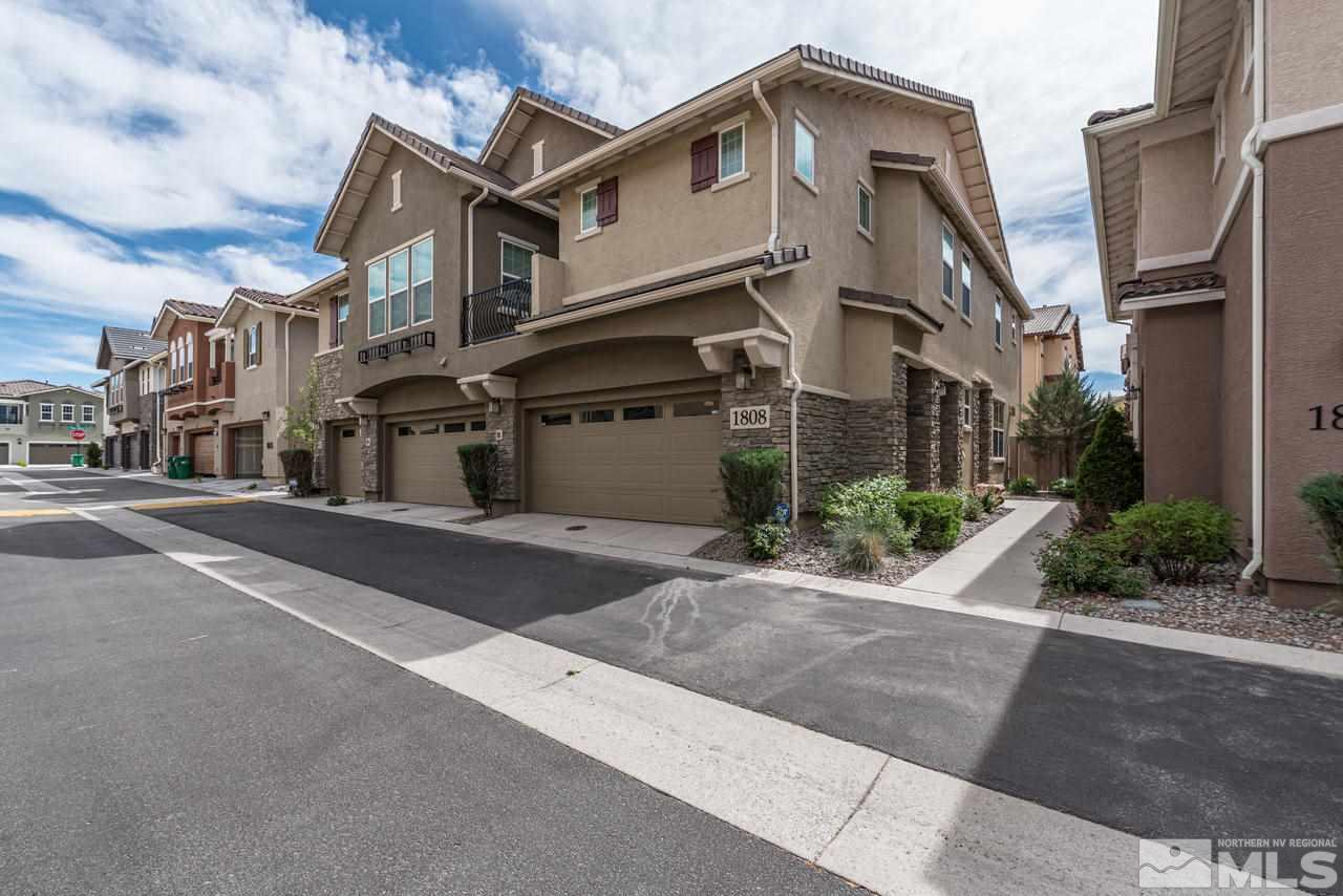 1808 Wind Ranch Road, Unit B Reno, NV 89521 - Photo 1 of 31 a view of a street with house