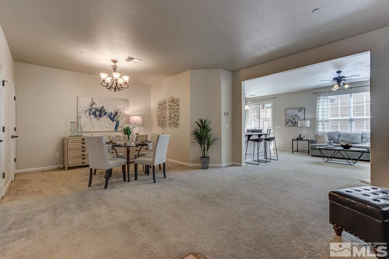 1808 Wind Ranch Road, Unit B Reno, NV 89521 - Photo 4 of 31 a view of a livingroom with furniture and a chandelier