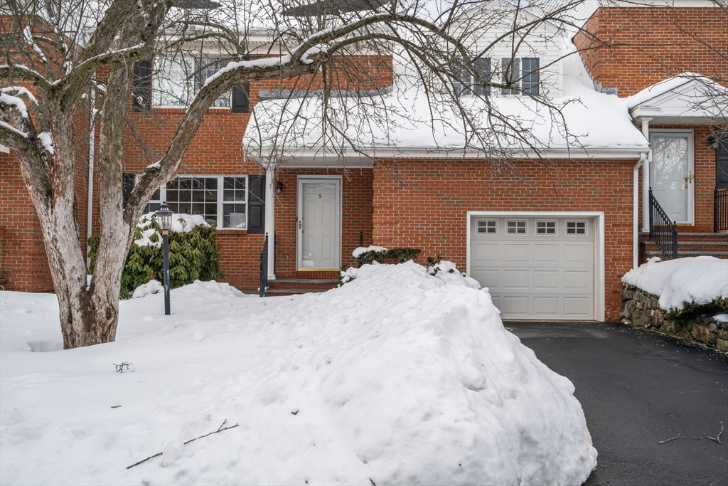 9 April Lane, Unit 9 Lexington, MA 02421 - Photo 4 of 38 a view of a house with a snow in the yard
