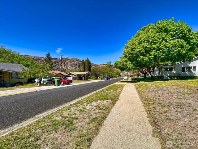 a view of street with houses