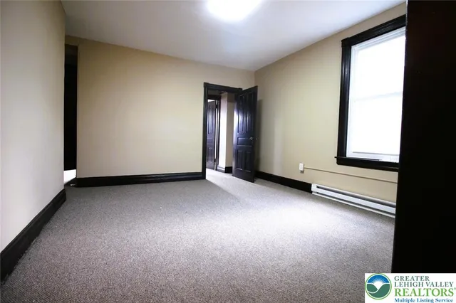 an empty room with windows