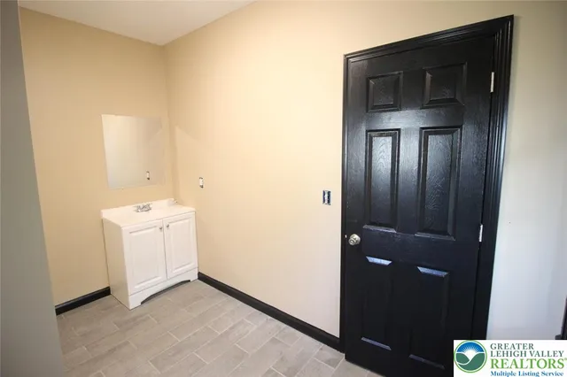 a utility room with a sink