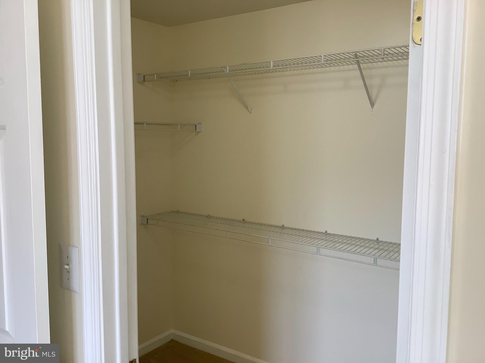 692 Winding Stream Way, Unit 204 Odenton, MD 21113 - Photo 11 of 17 Master Bedroom Walk-In Clolset