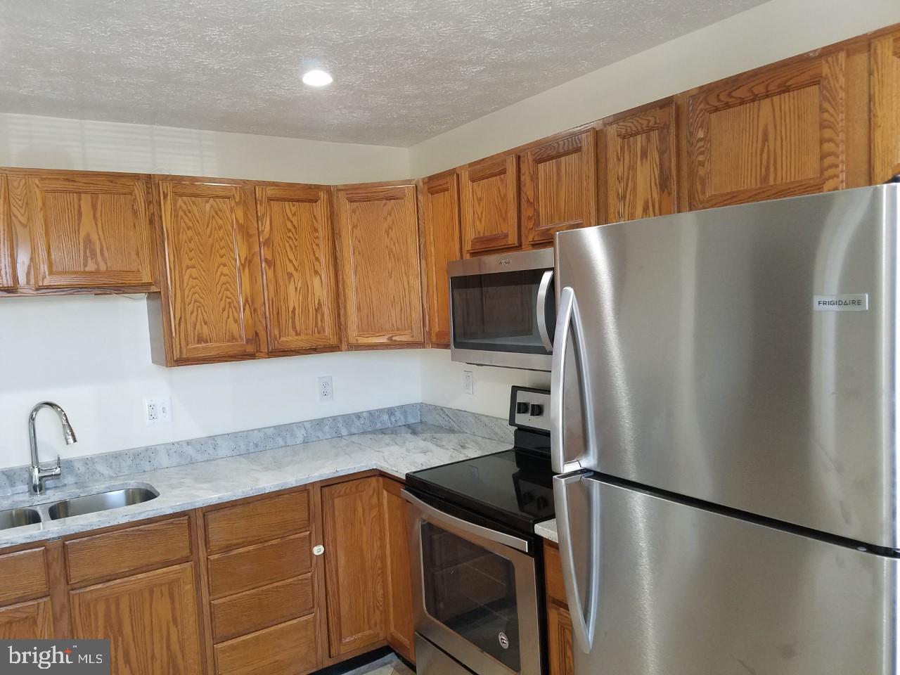 692 Winding Stream Way, Unit 204 Odenton, MD 21113 - Photo 6 of 17 Kitchen with granite countertops