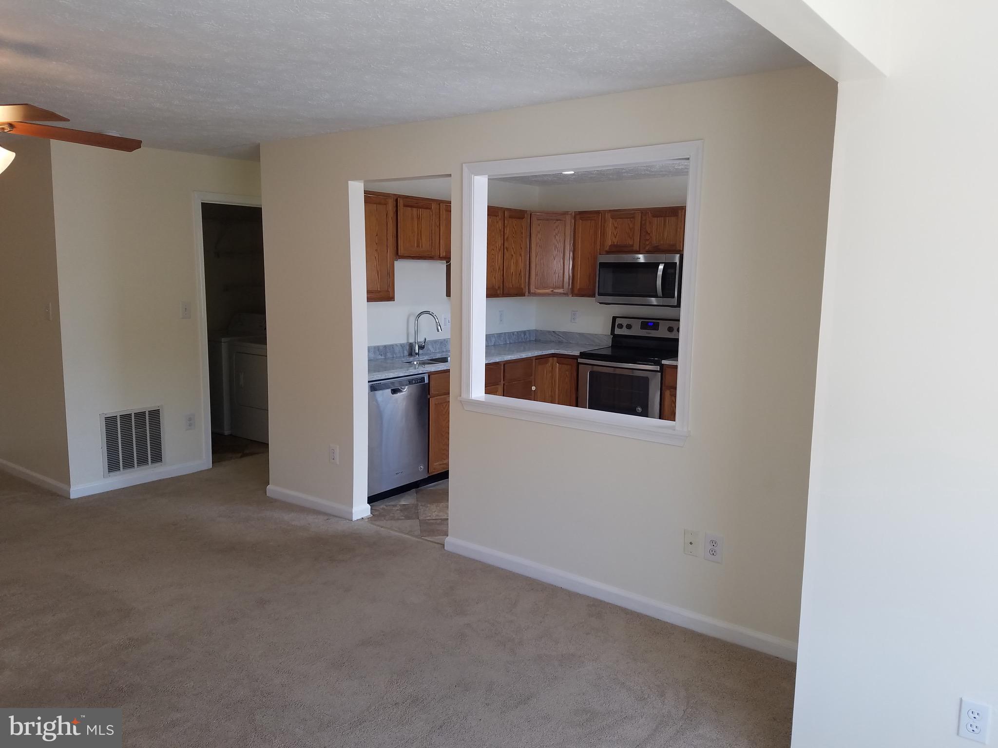 692 Winding Stream Way, Unit 204 Odenton, MD 21113 - Photo 7 of 17 Kitchen with granite countertops