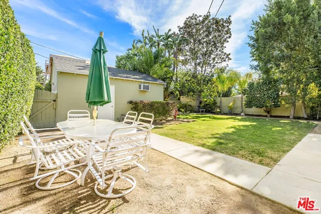 a view of a swimming pool with an outdoor space