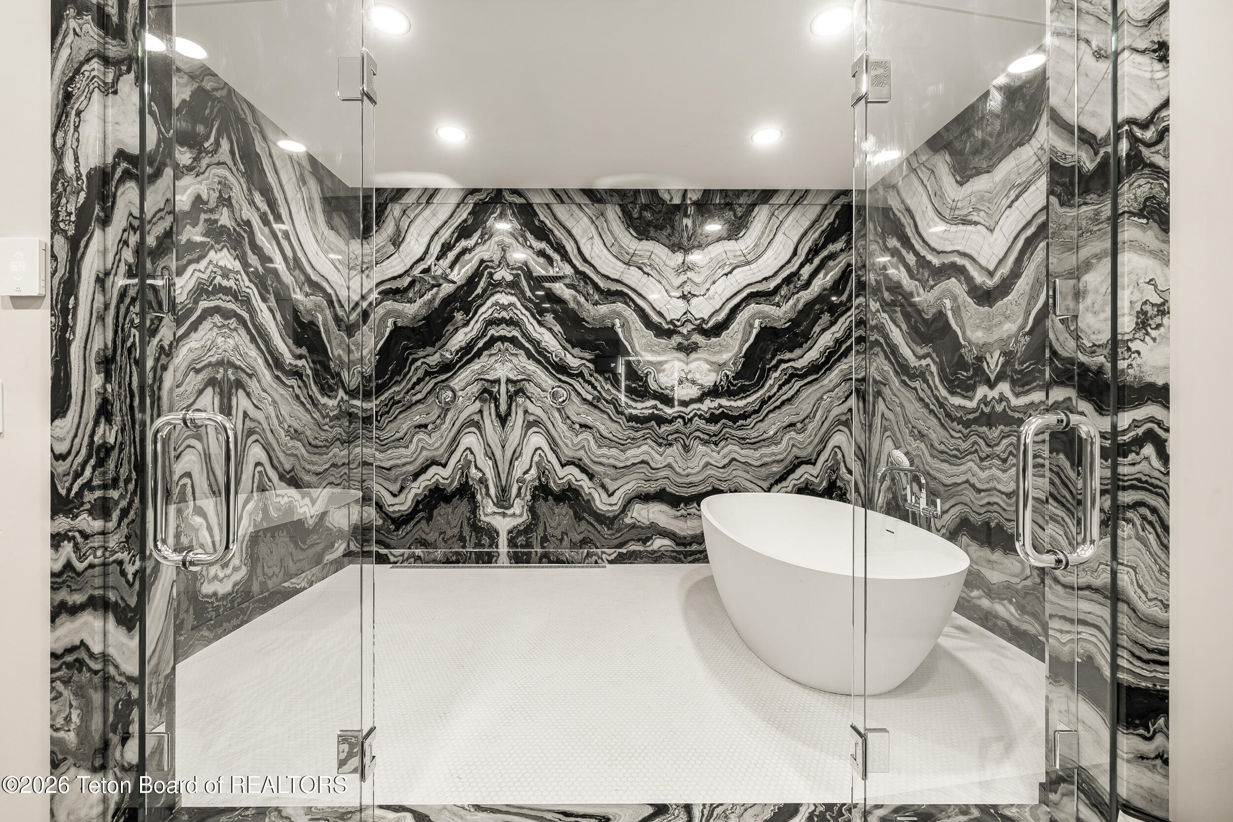 8910 Porter Loop Road Jackson, WY 83001 - Photo 40 of 85 Steam Room with Book matched slabs