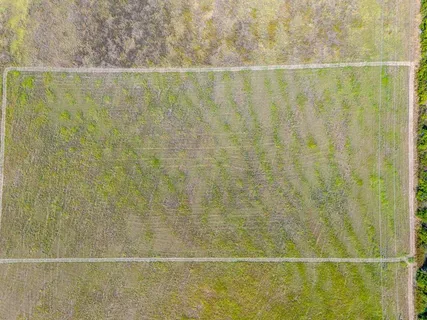 a bathroom with a bathtub and window