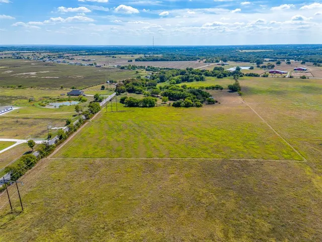 a view of an ocean and city