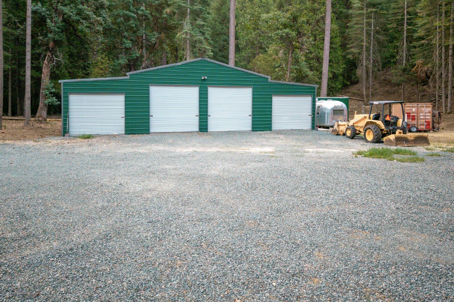 10623 Yearling Road Nevada City, CA 95959 - Photo 4 of 59 a front view of a house with a yard and garage