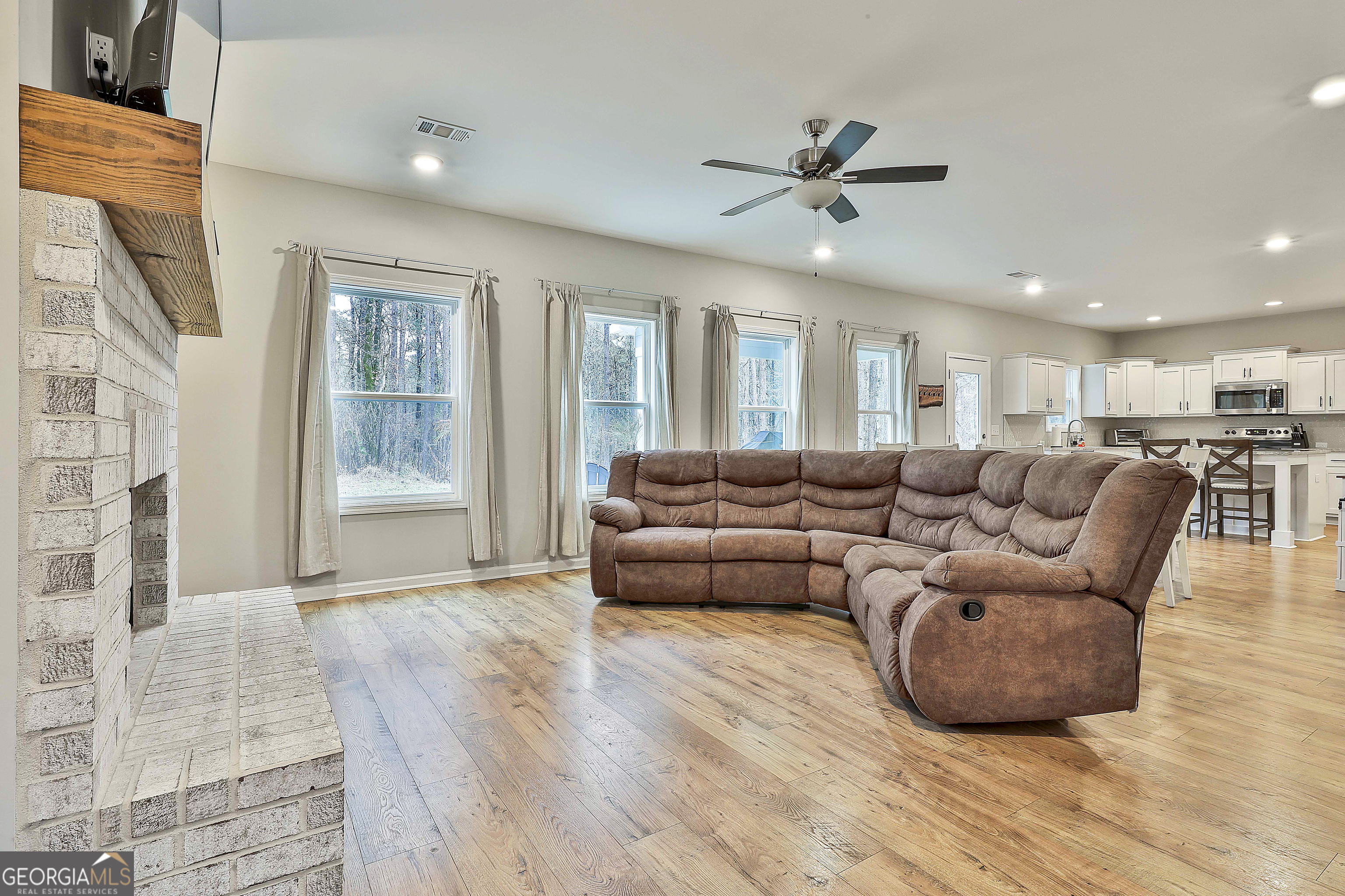 250 Mobley Bridge Road LaGrange, GA 30241 - Photo 12 of 42 a living room with furniture and a large window