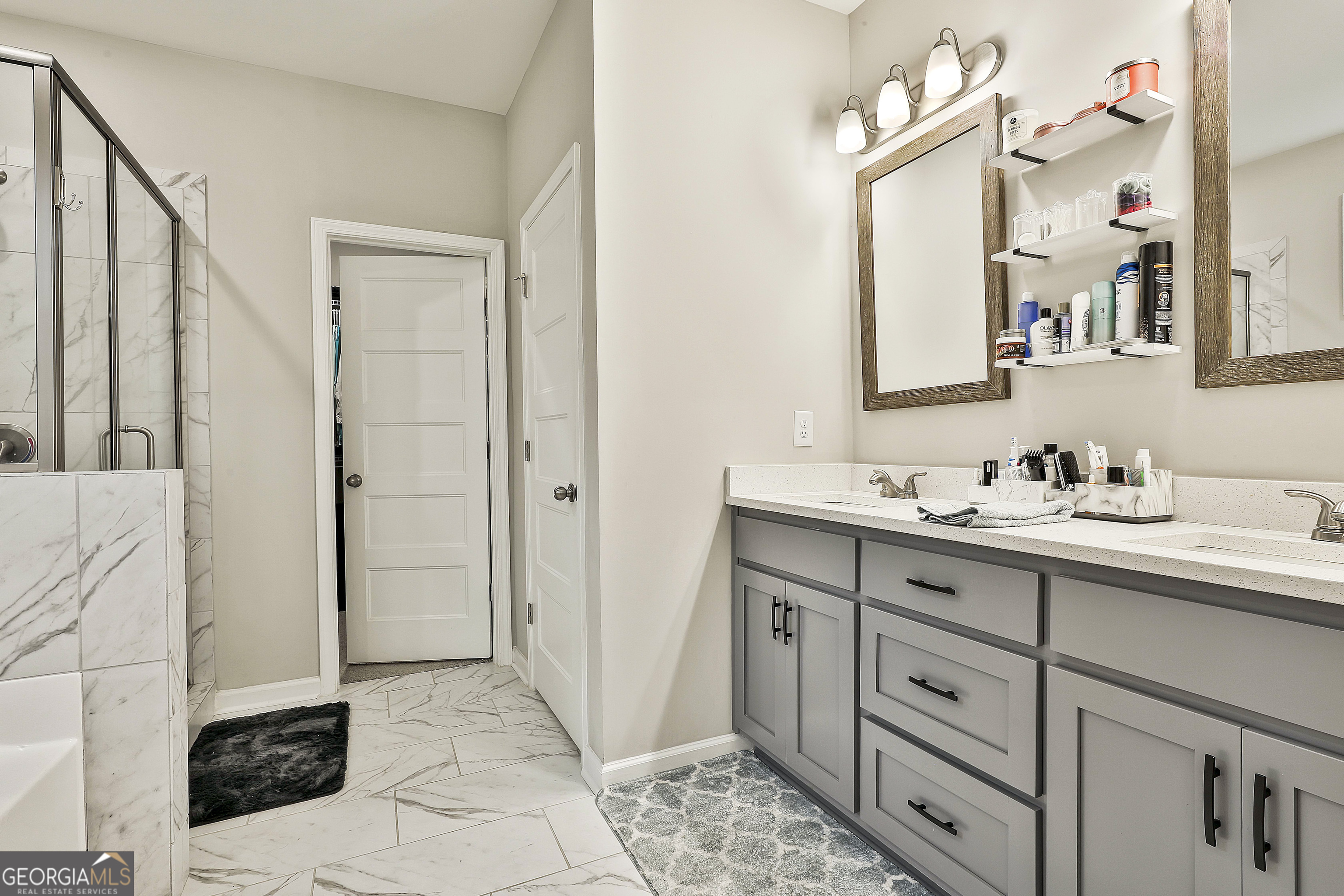 250 Mobley Bridge Road LaGrange, GA 30241 - Photo 26 of 42 a bathroom with a sink and a mirror