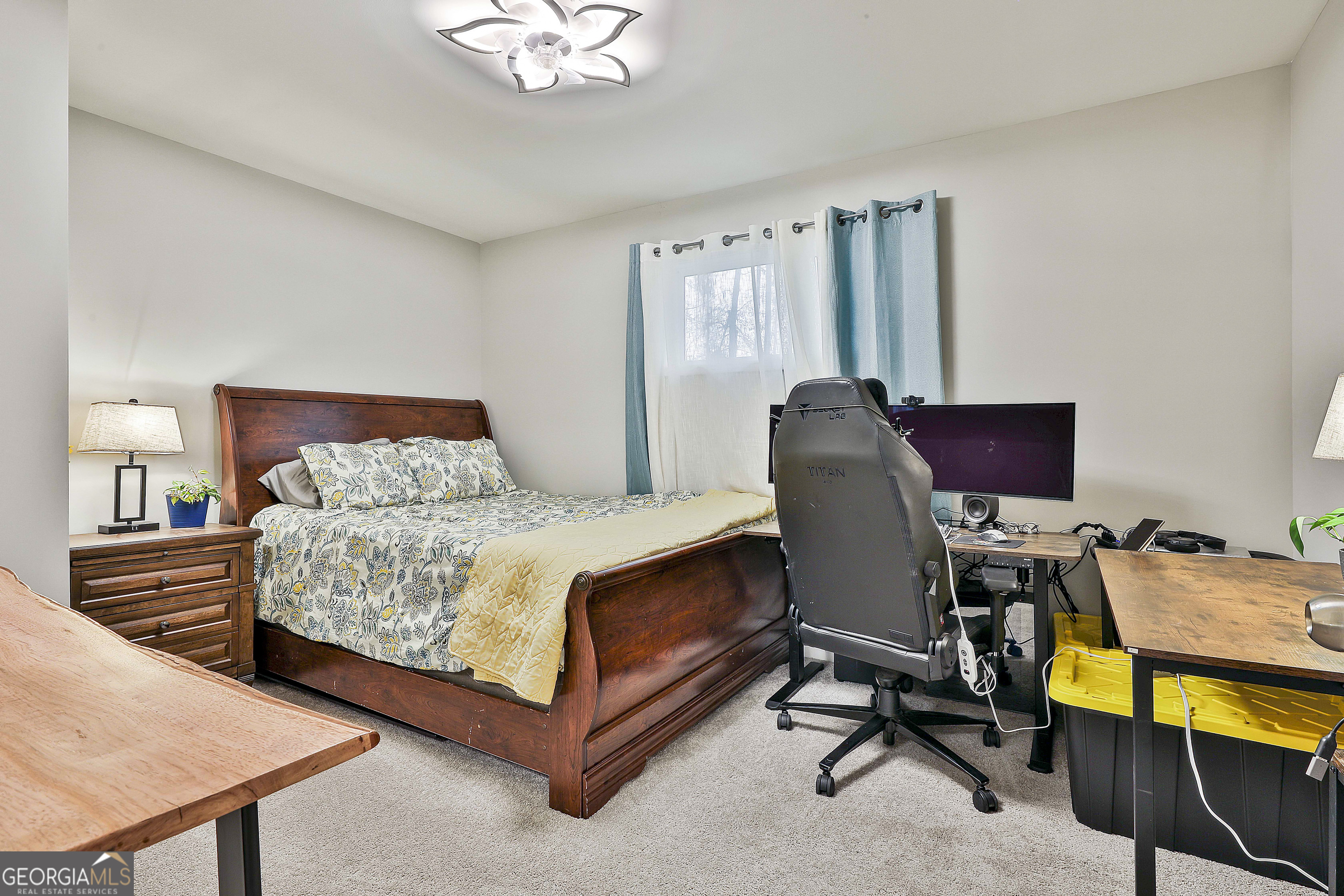 250 Mobley Bridge Road LaGrange, GA 30241 - Photo 36 of 42 a bedroom with a bed and a desk
