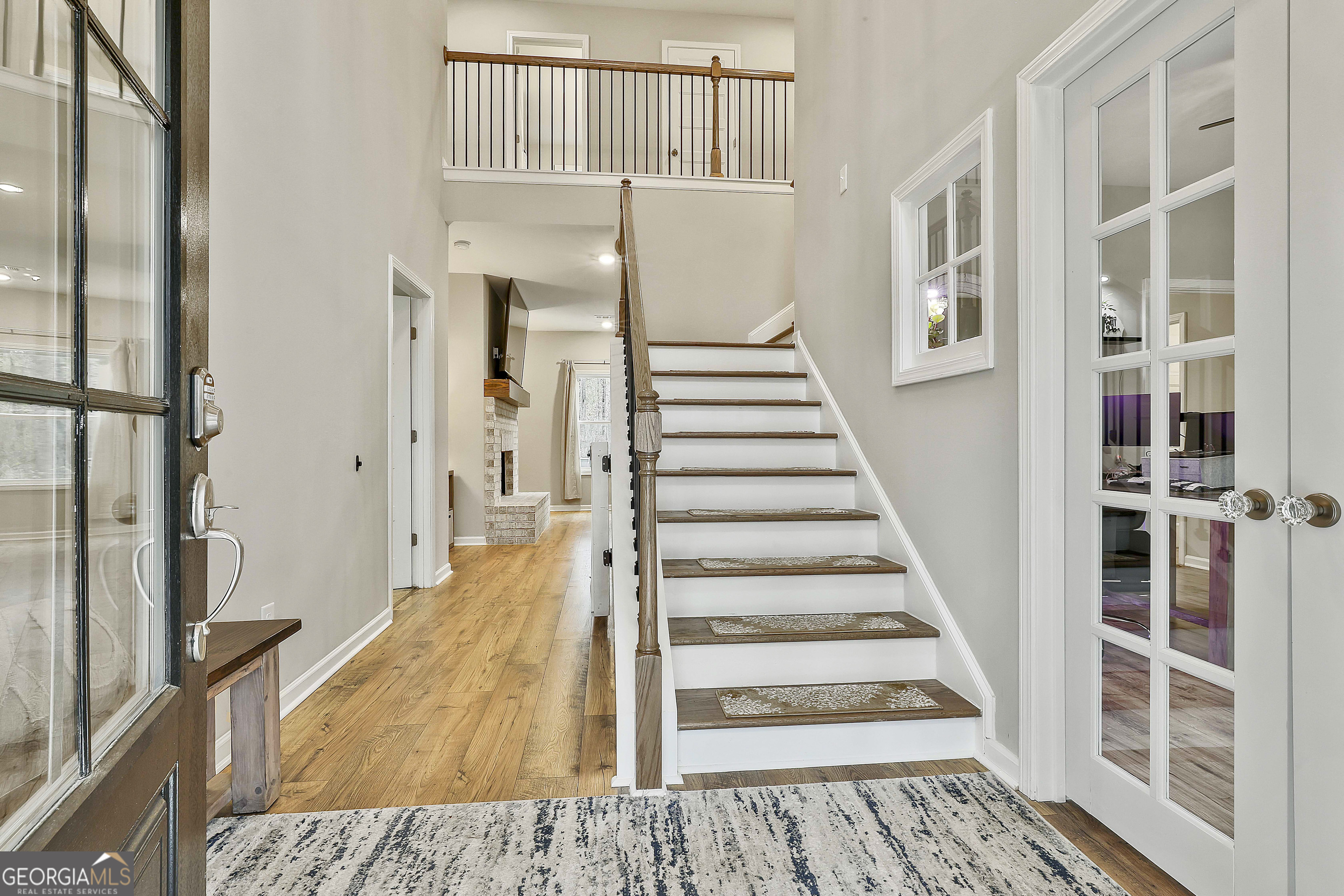 250 Mobley Bridge Road LaGrange, GA 30241 - Photo 8 of 42 a view of a hallway with wooden floor and entryway