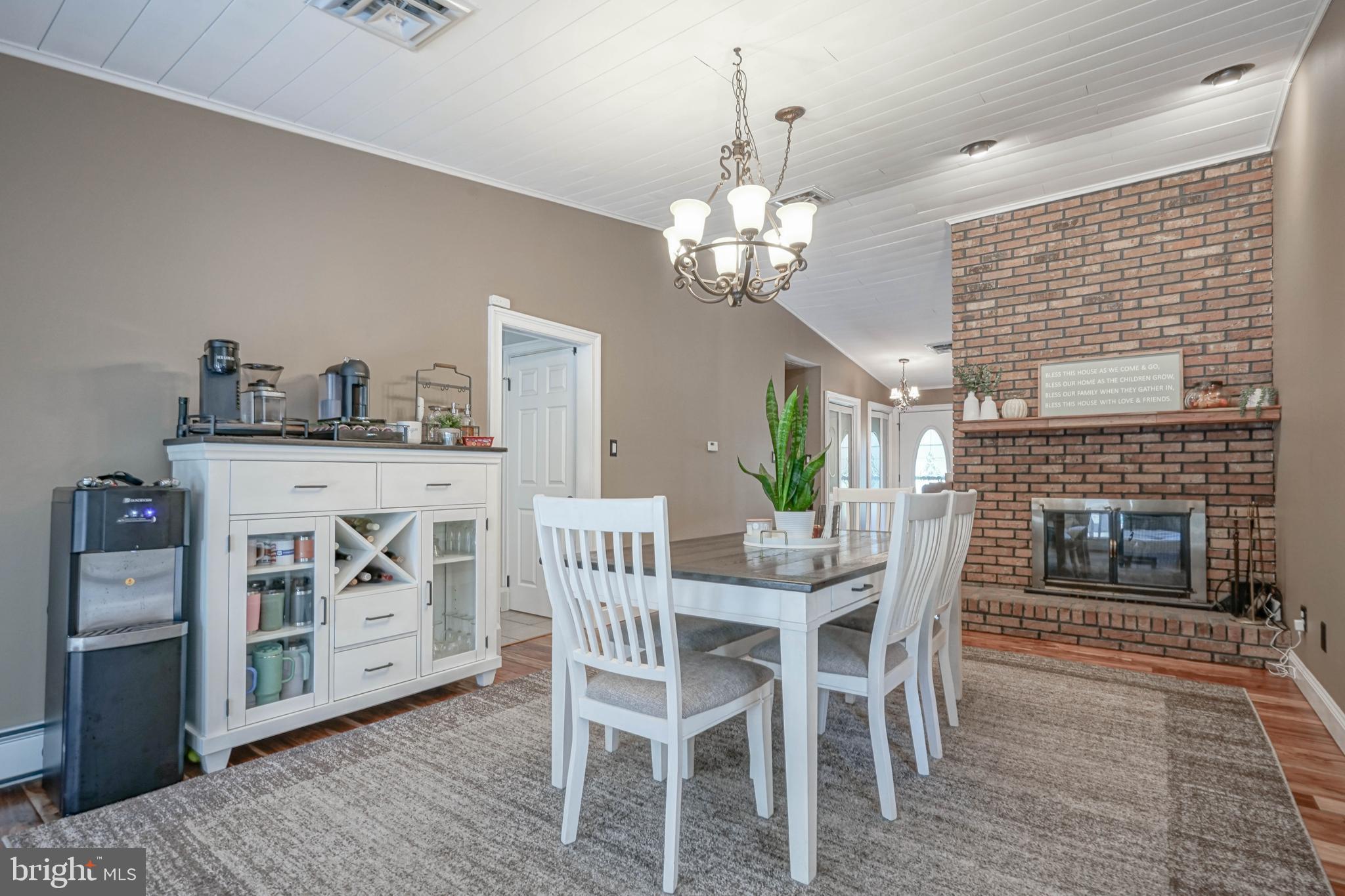 750 Moss Mill Road Hammonton, NJ 08037 - Photo 12 of 57 a view of a dining room with furniture and chandelier