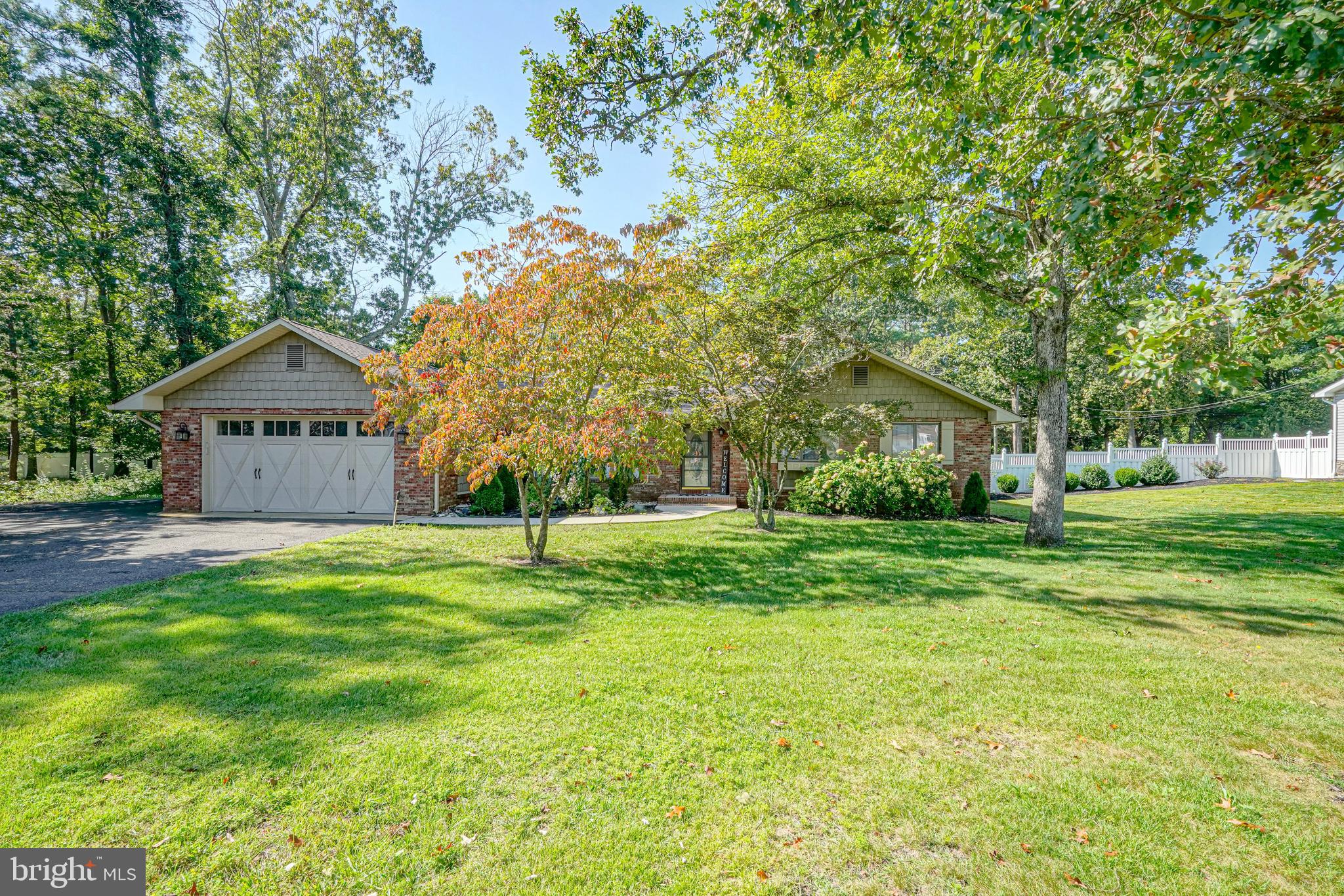 750 Moss Mill Road Hammonton, NJ 08037 - Photo 2 of 57 a house with green field in front of it