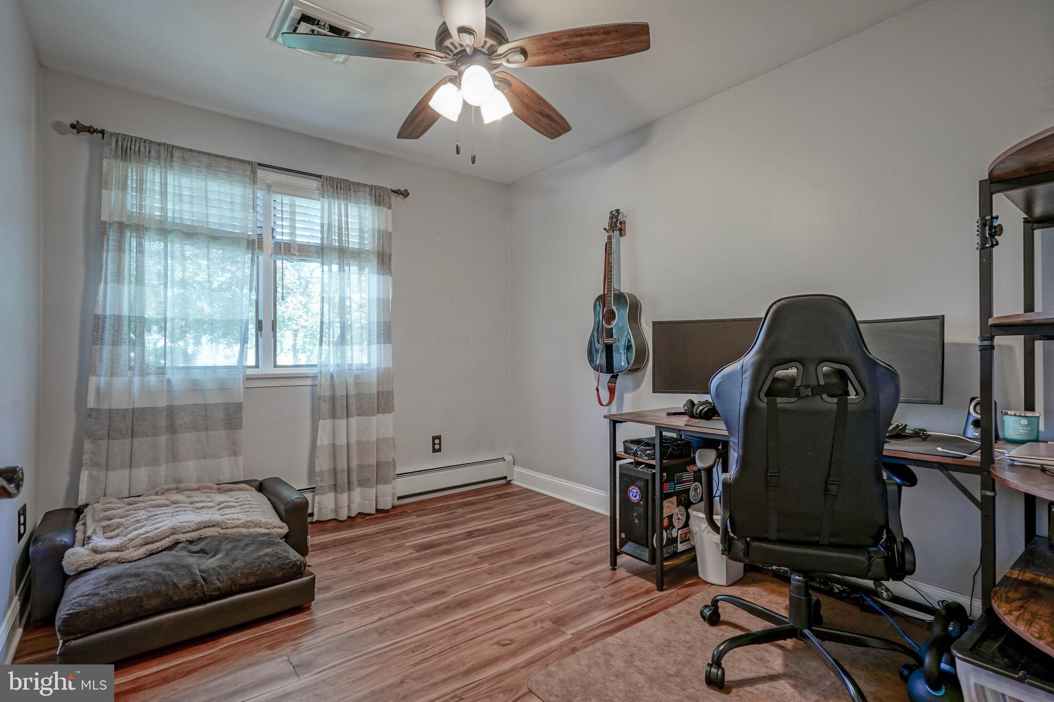 750 Moss Mill Road Hammonton, NJ 08037 - Photo 23 of 57 a view of a workspace with furniture and a window