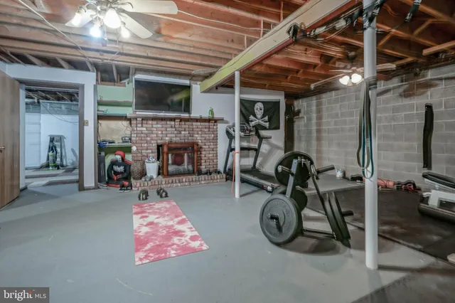 a view of deck with table and chairs a barbeque with wooden floor and fence