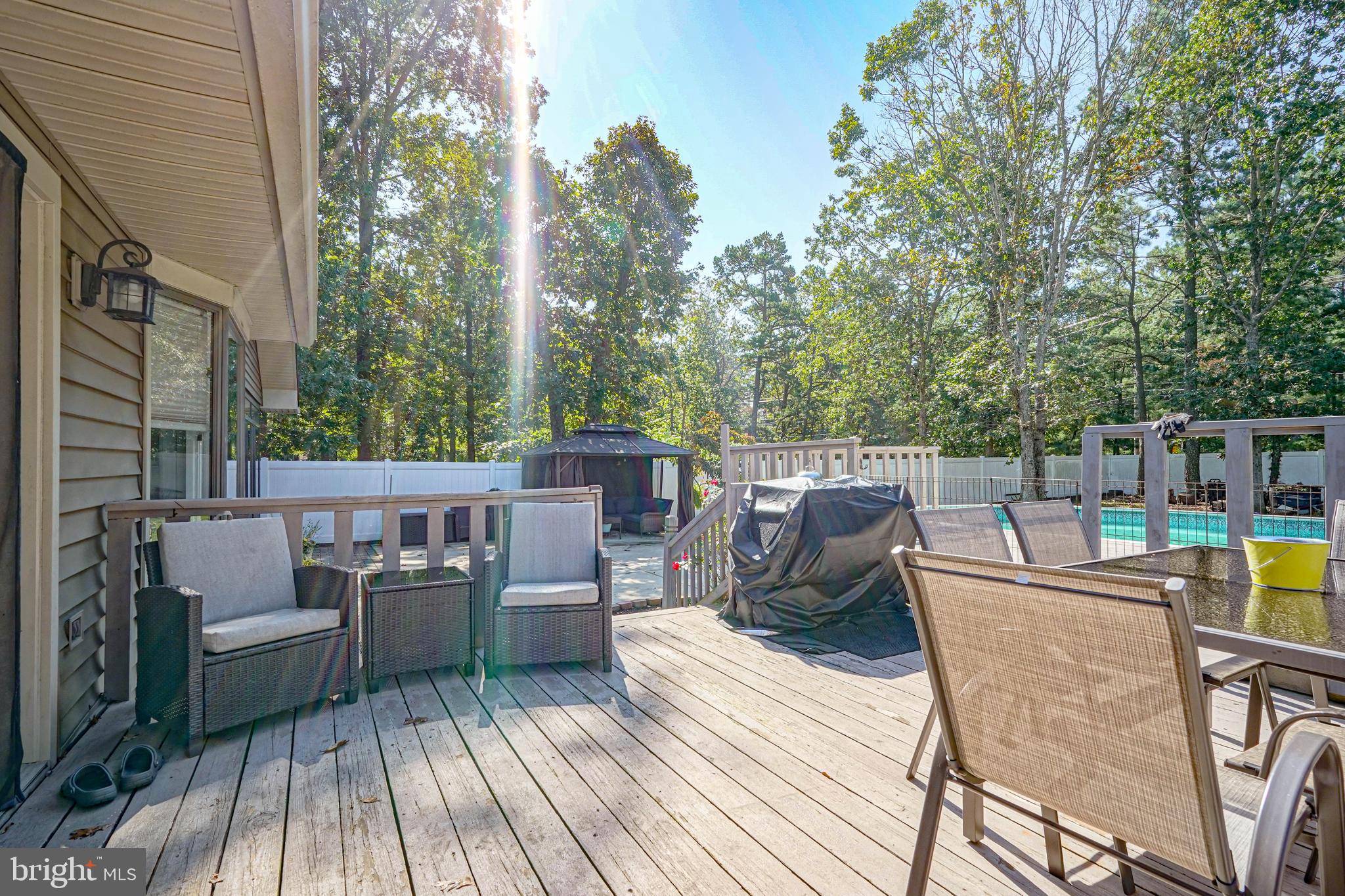 750 Moss Mill Road Hammonton, NJ 08037 - Photo 41 of 57 a view of a patio with couches chairs and wooden floor