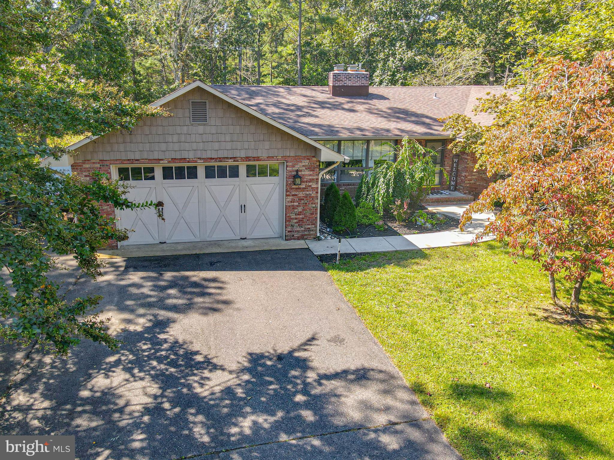 750 Moss Mill Road Hammonton, NJ 08037 - Photo 46 of 57 a front view of a house with a yard