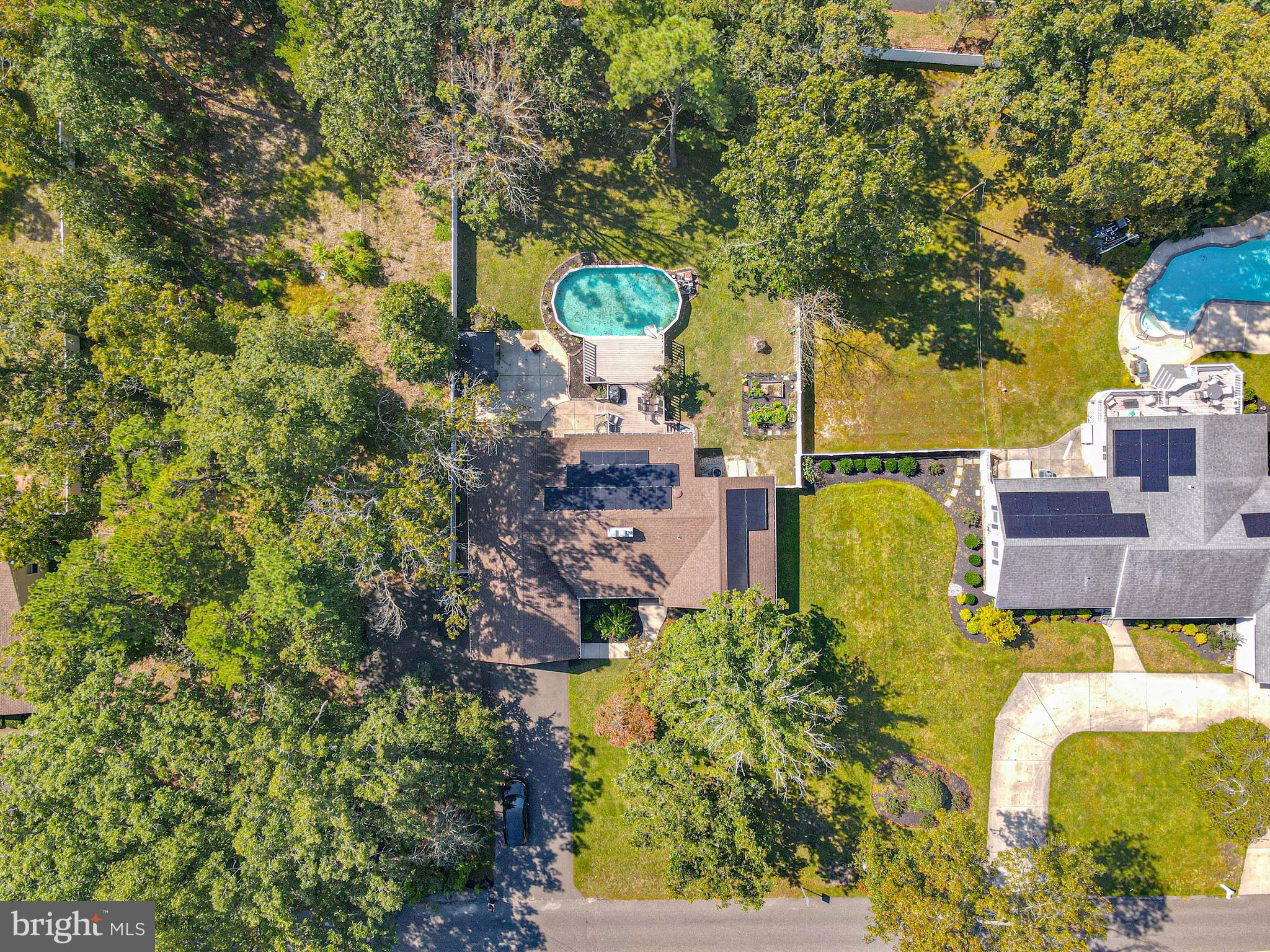 750 Moss Mill Road Hammonton, NJ 08037 - Photo 50 of 57 an aerial view of a house with swimming pool a yard and a large tree