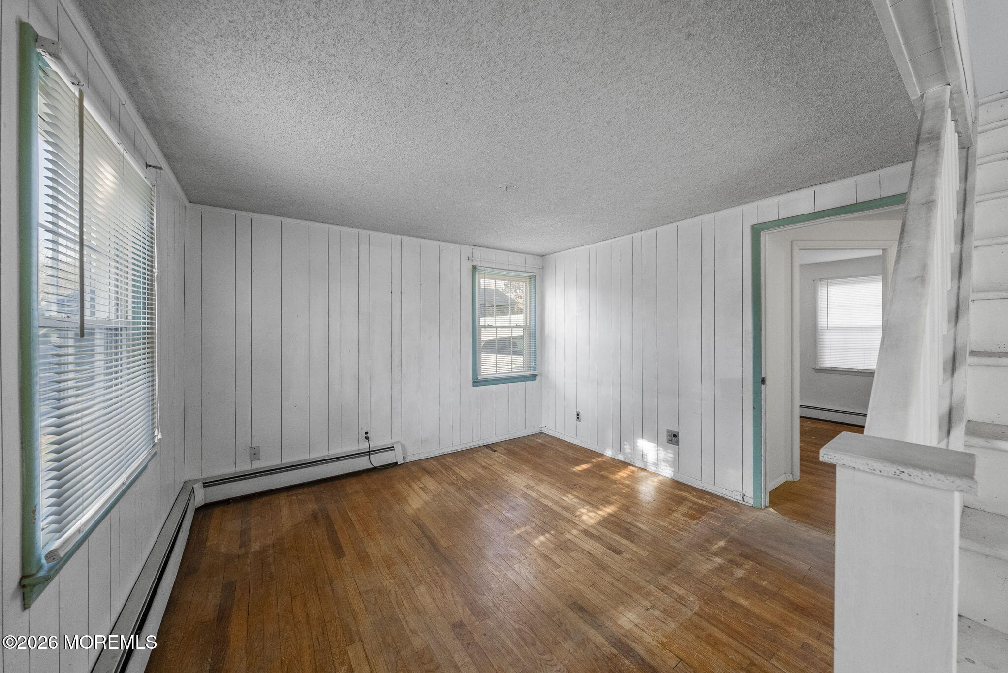 517 Middle Lane Howell, NJ 07731 - Photo 14 of 31 a view of livingroom with hardwood floor and a ceiling fan