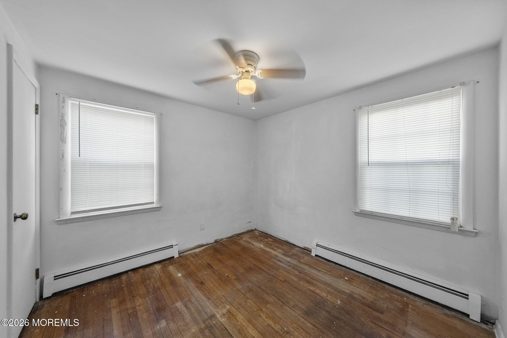 517 Middle Lane Howell, NJ 07731 - Photo 16 of 31 an empty room with window and ceiling fan