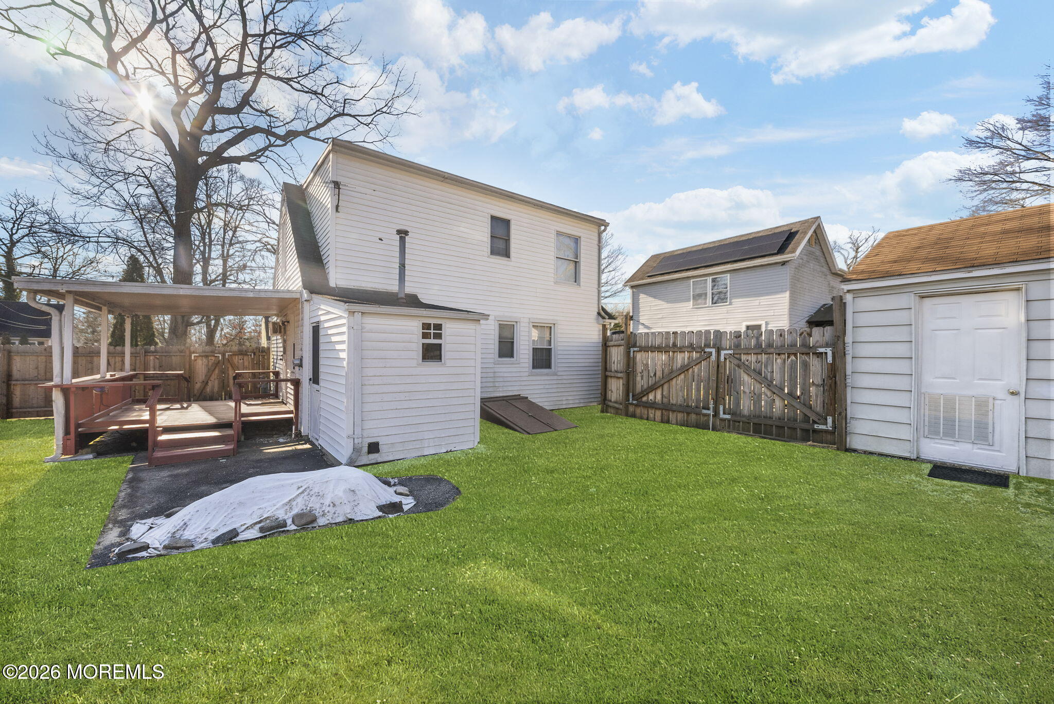 517 Middle Lane Howell, NJ 07731 - Photo 20 of 31 a view of a backyard with a garden