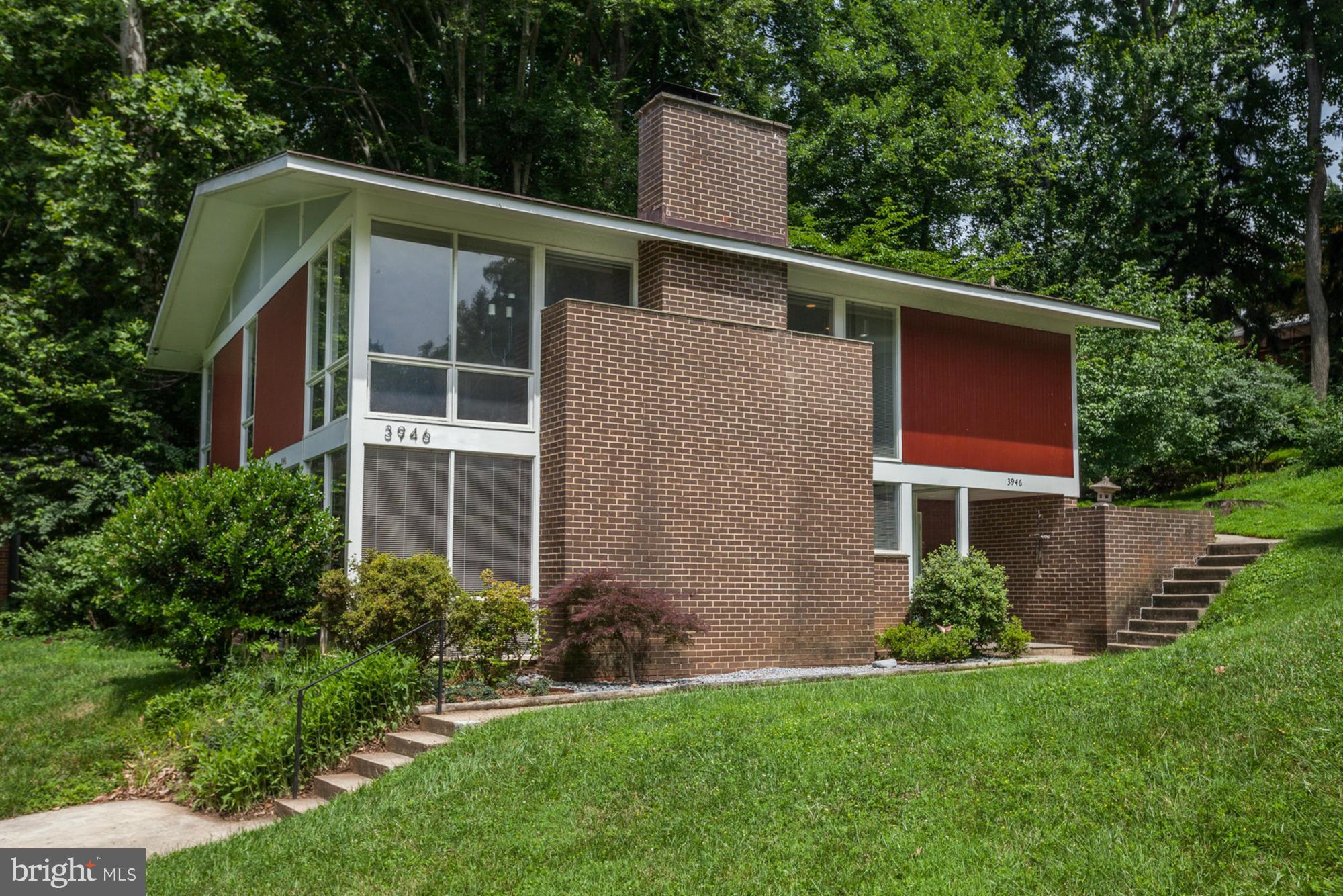 3946 Rickover Road Silver Spring, MD 20902 - Photo 2 of 30 a front view of house with yard and green space