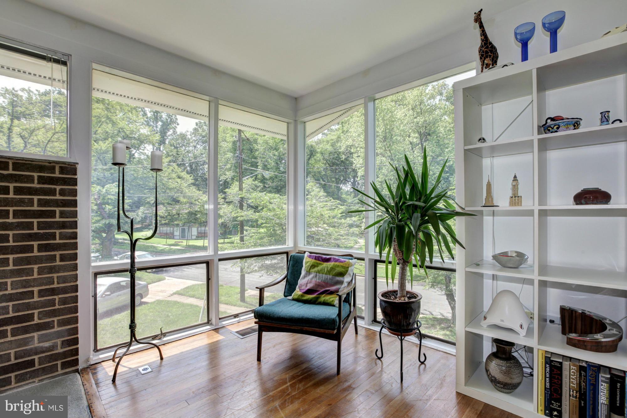3946 Rickover Road Silver Spring, MD 20902 - Photo 14 of 30 a living room with furniture and a potted plant with wooden floor