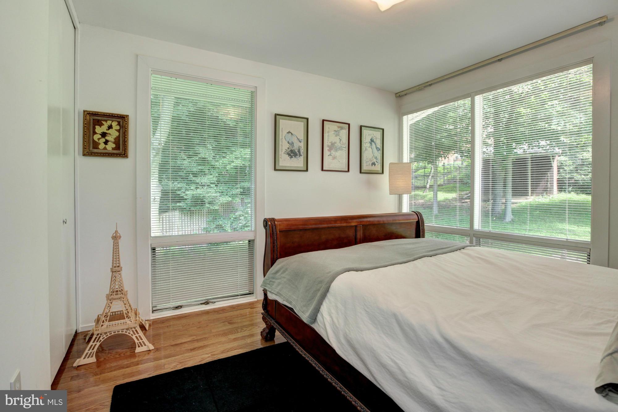 3946 Rickover Road Silver Spring, MD 20902 - Photo 18 of 30 a bedroom with a bed and a window