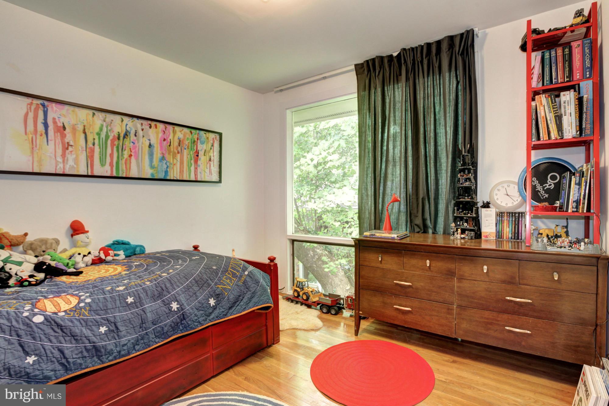 3946 Rickover Road Silver Spring, MD 20902 - Photo 20 of 30 a bedroom with a bed and a window