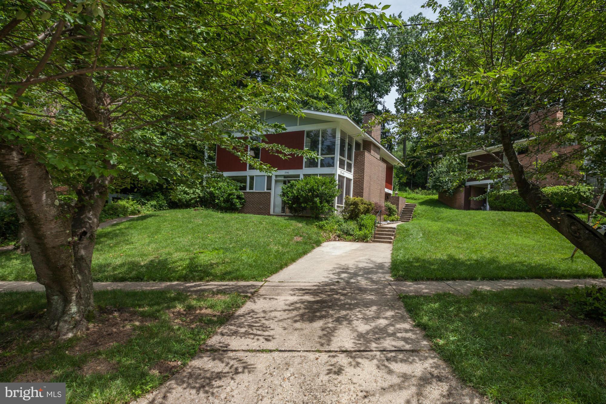 3946 Rickover Road Silver Spring, MD 20902 - Photo 29 of 30 a front view of a house with a yard