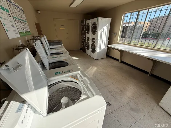 a car parked in front of a white house