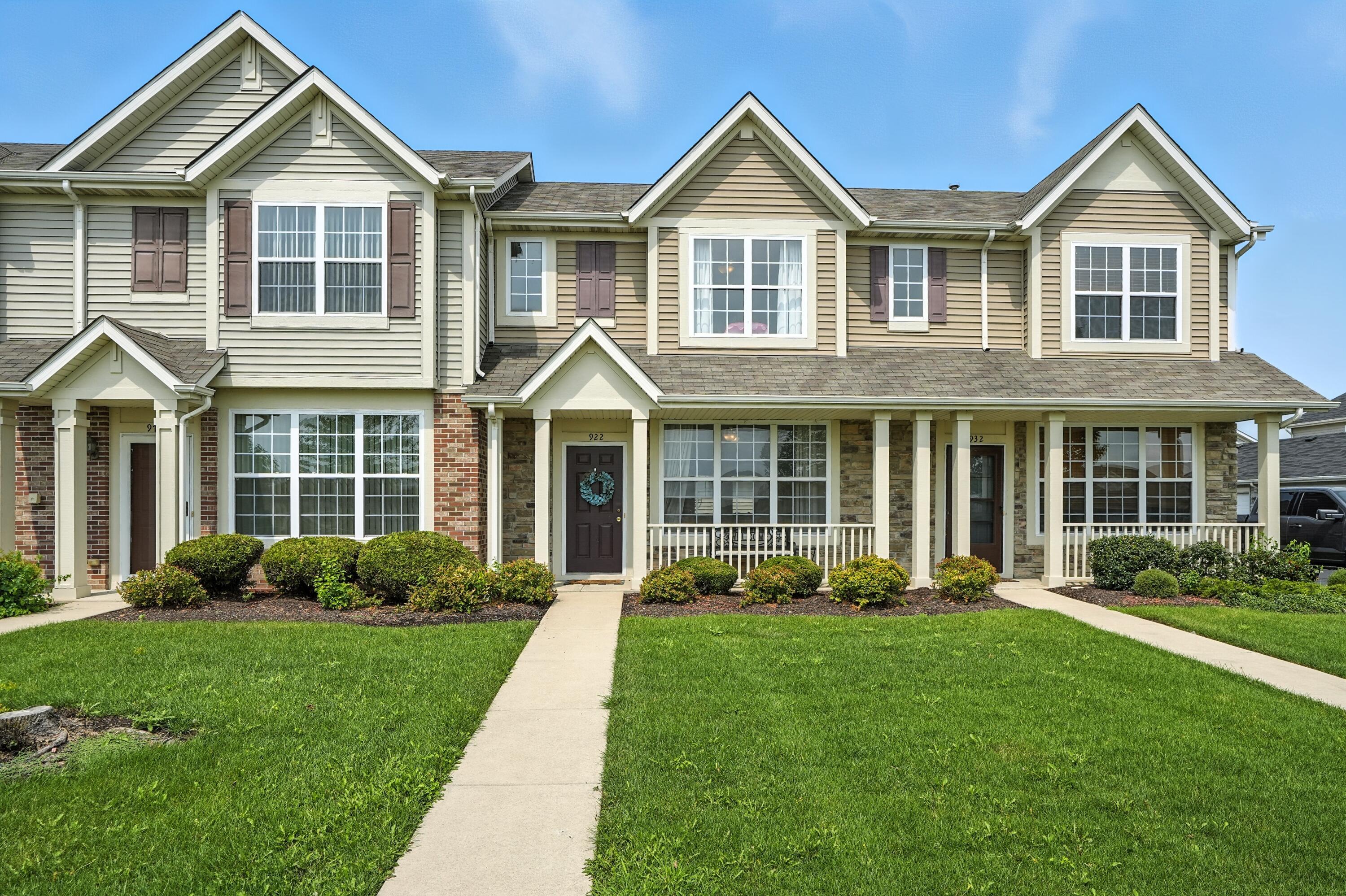 922 East 115th Place Crown Point, IN 46307 - Photo 1 of 23 a front view of a house with a yard