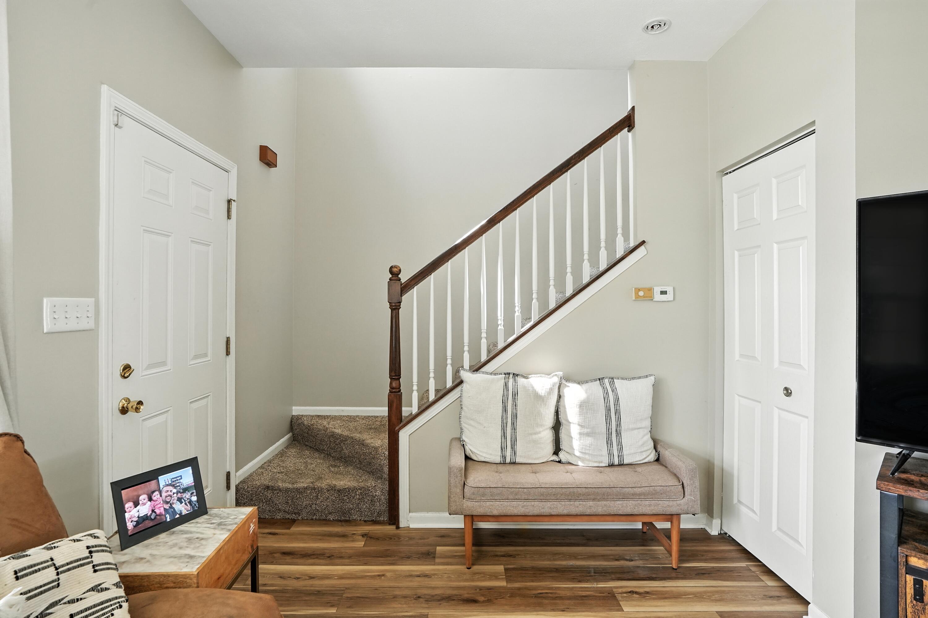 922 East 115th Place Crown Point, IN 46307 - Photo 11 of 23 a view of entryway and hall with wooden floor