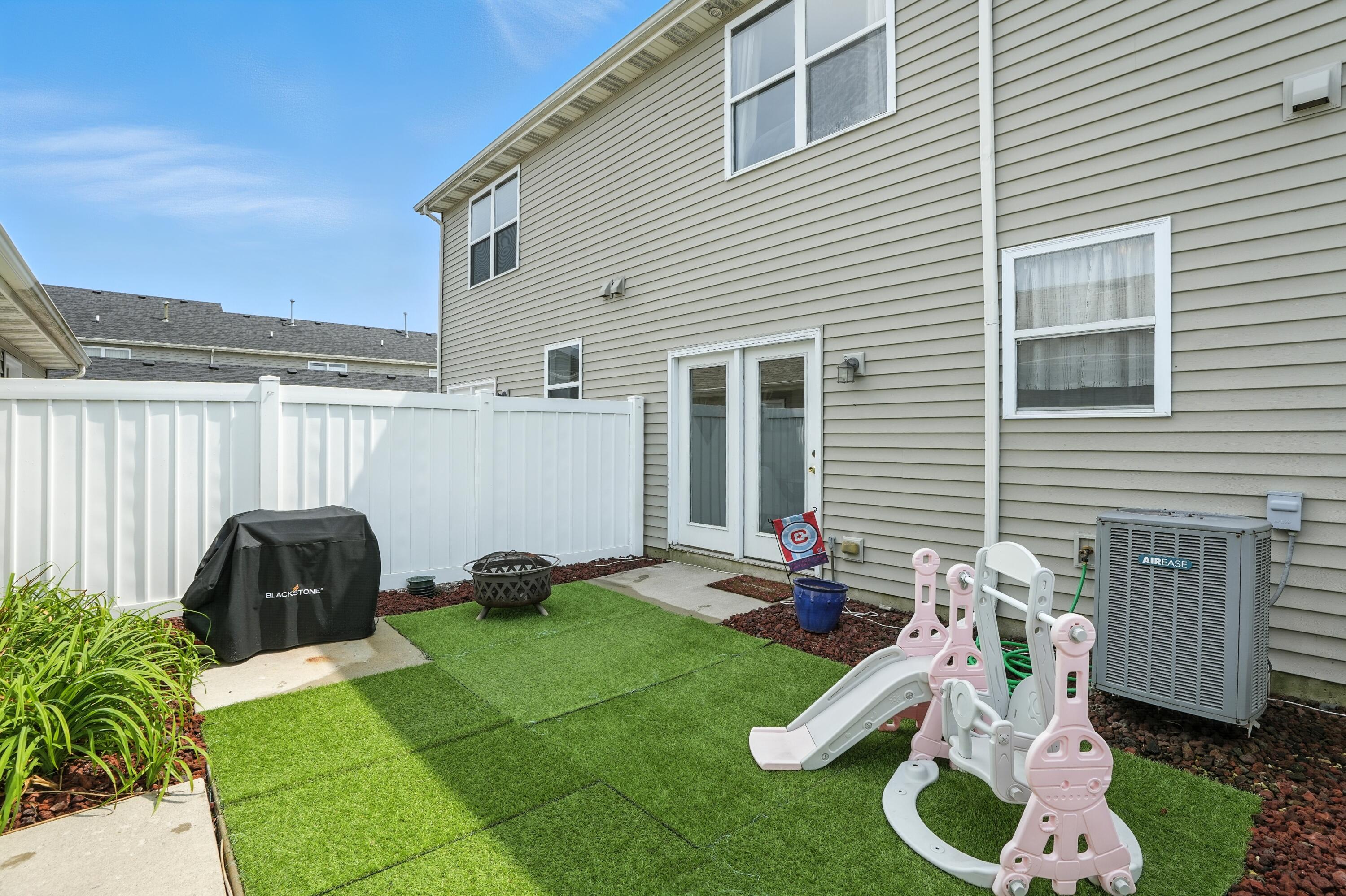 922 East 115th Place Crown Point, IN 46307 - Photo 21 of 23 a view of a chairs in patio