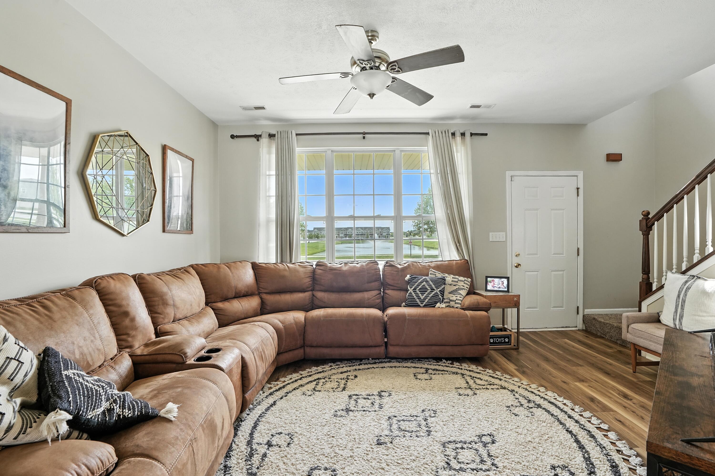 922 East 115th Place Crown Point, IN 46307 - Photo 4 of 23 a living room with furniture and a window
