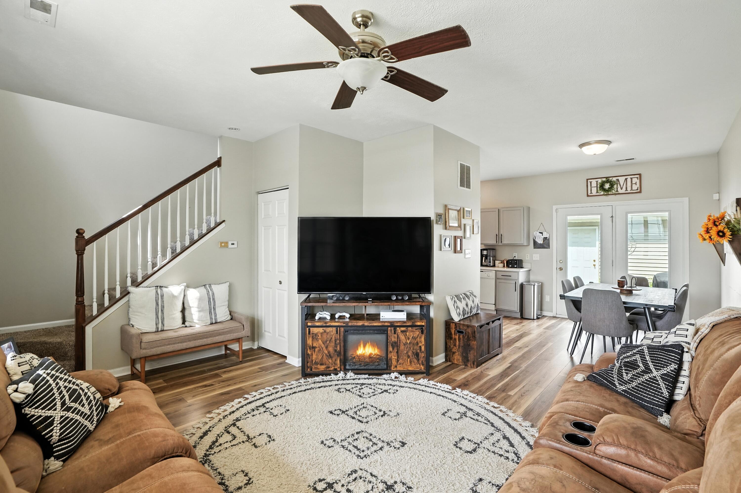 922 East 115th Place Crown Point, IN 46307 - Photo 5 of 23 a living room with furniture and a flat screen tv