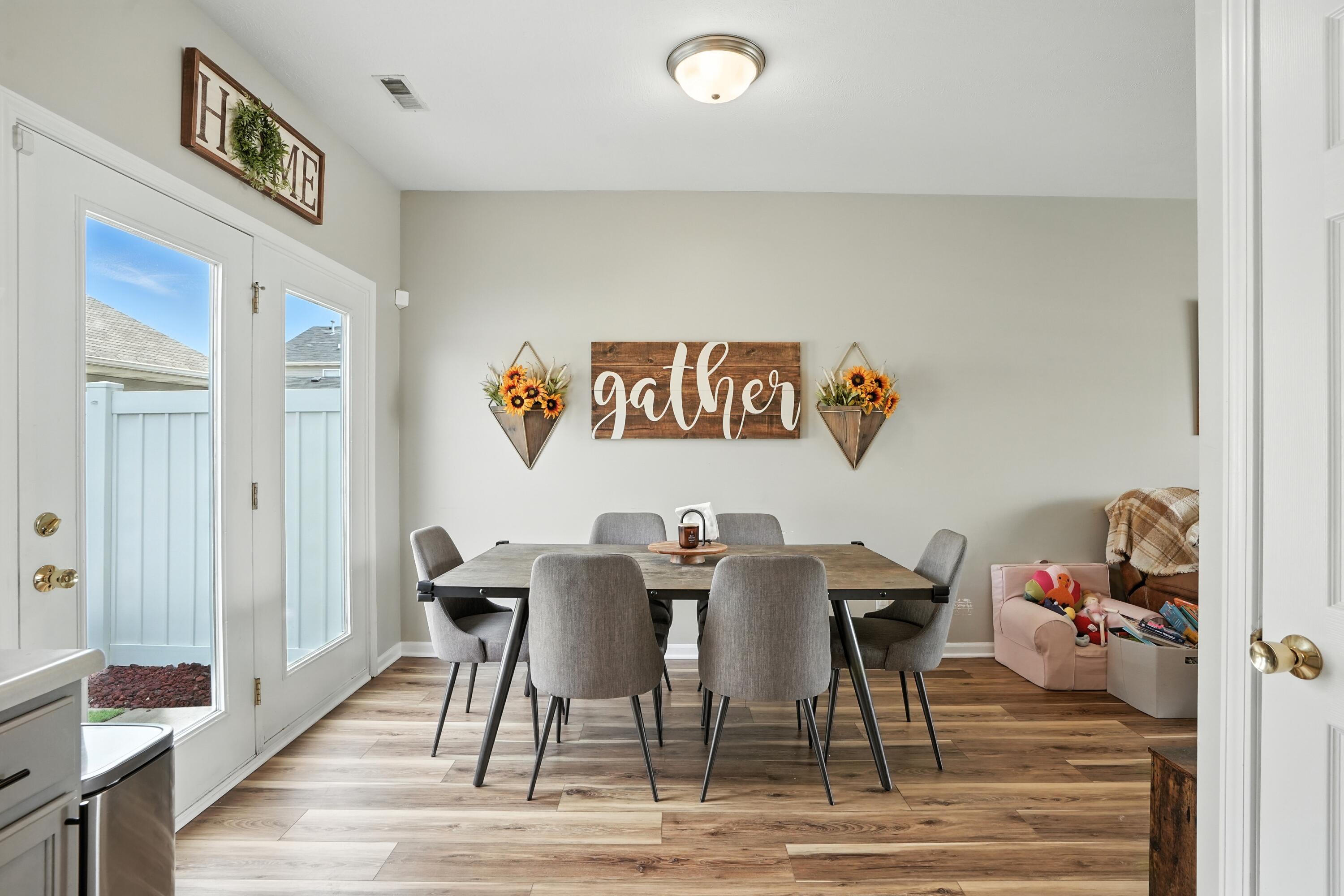 922 East 115th Place Crown Point, IN 46307 - Photo 9 of 23 a view of a dining room with furniture